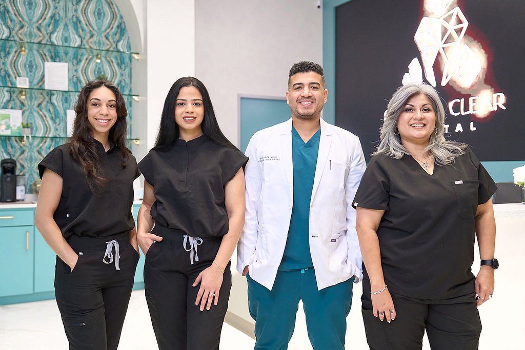 Friendly dental team at Crystal Clear Dental standing together, providing expert care for families seeking a trusted family dentist in San Antonio.