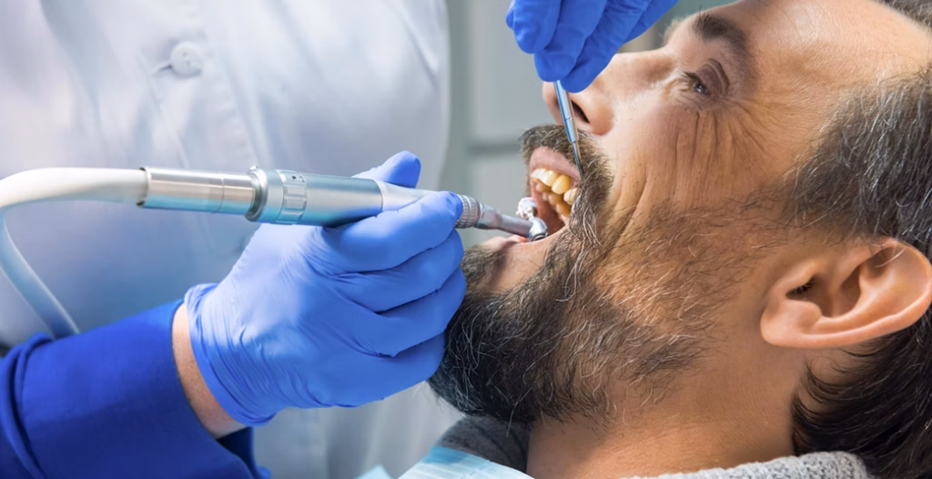 Dental ozone therapy performed by a professional in gloves