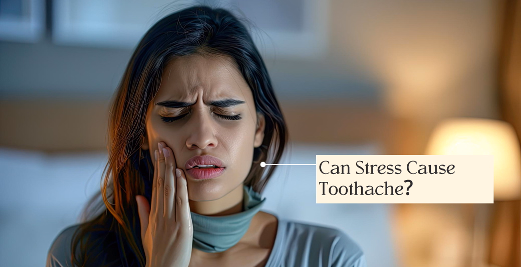 Person holding cheek in pain, suggesting toothache, with text overlay asking "Can Stress Cause Toothache?" in softly lit bedroom setting.