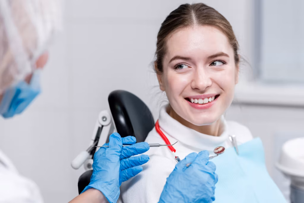 restorative dentistry in San Antonio with dentist repairing patient smile using advanced dental treatment