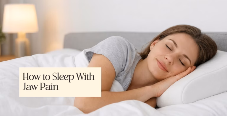 Woman sleeping peacefully on her side with text overlay 'How to Sleep With Jaw Pain'.
